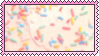 white frosting with rainbow sprinkles